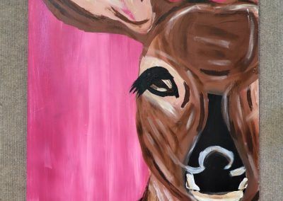 Bambi - acrylic on wood has a profile female deer on the right side of the canvas on a bright pink background.